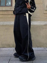 Men’s Contrast Paneled Loose Parachute Pants Black / L Wide Leg Pants