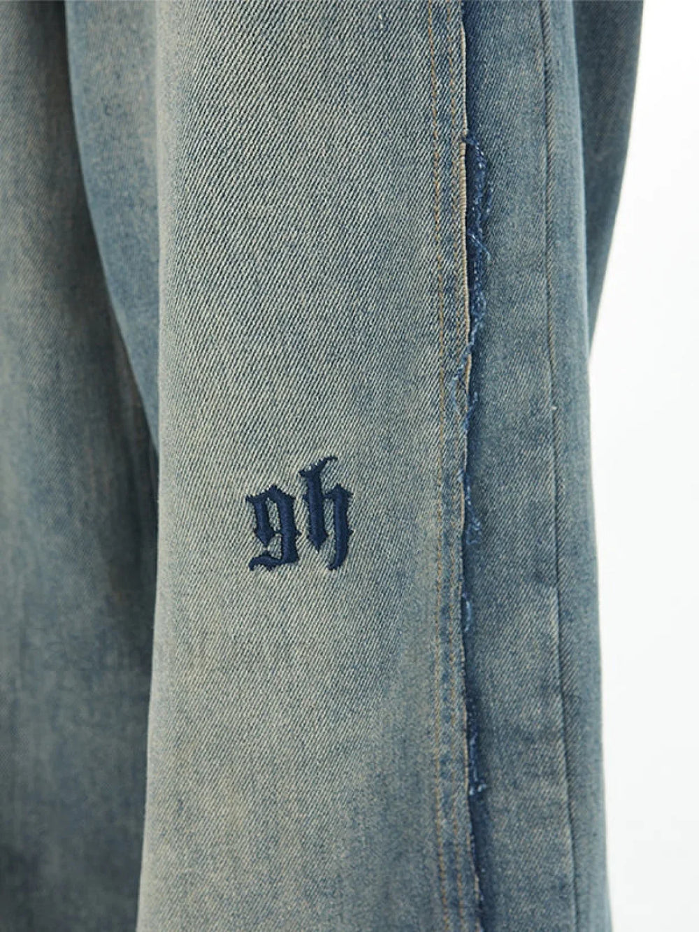 Men’s Faded Patchwork Distressed Loose Jeans loose jeans