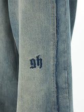 Men’s Faded Patchwork Distressed Loose Jeans loose jeans